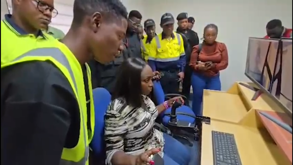 MDF Administrator, Dr. Hanna Bisiw-Kotei, operates the AngloGold Ashanti simulator.